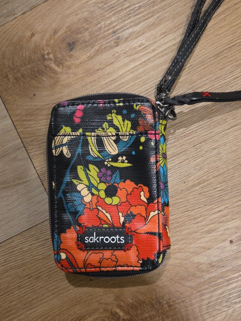 Sakroots Black Floral Wristlet Phone Case with Orange & Green Accents